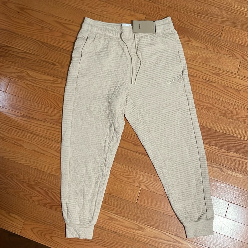 Men’s tan Nike yoga/sweatpants